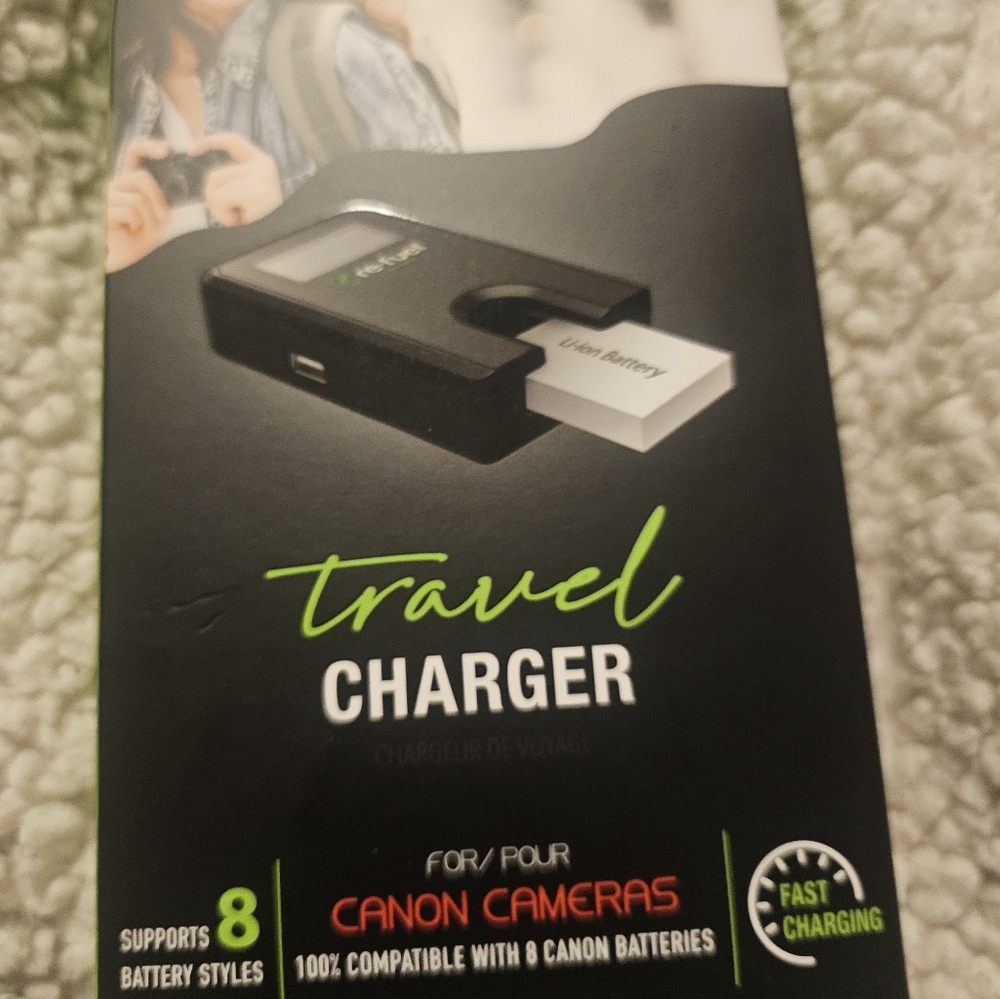 Travel charger for Canon camera. NEW IN BOX